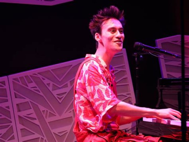 Unveiling The Secrets Of Jacob Collier's Towering Presence